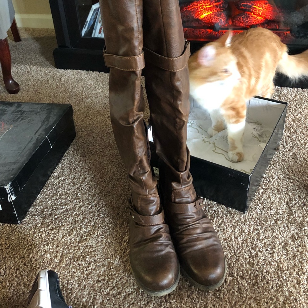 Carlos Santana over the knee boots in brown